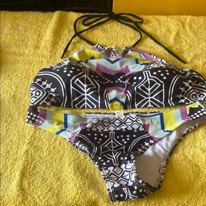 Vibrant Black and Yellow Bikini with Tribal Accents